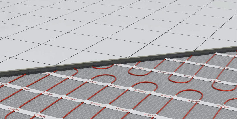 Underfloor heating system with thin mat and adhesive mesh